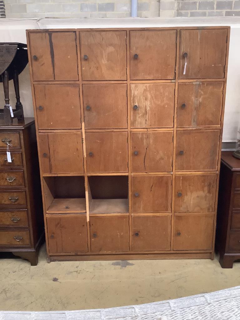 A mid 20th century locker cabinet (one door missing), width 128cm, depth 33cm, height 168cm